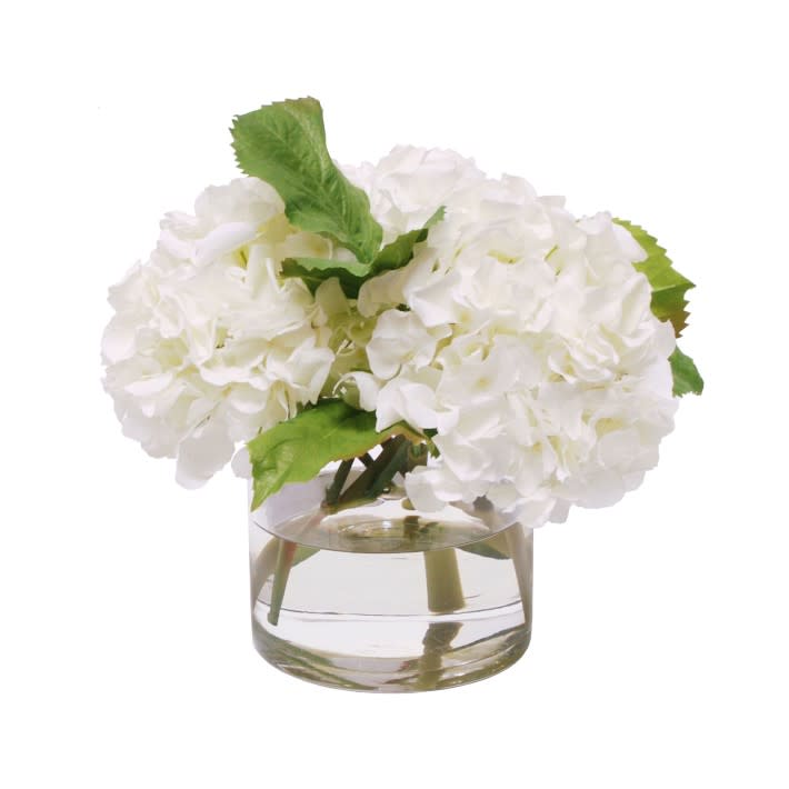 9) Faux White Hydrangeas in Glass Vase