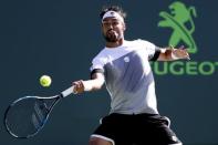 Mar 29, 2017; Miami, FL, USA; Fabio Fognini of Italy hits a forehand against Kei Nishikori of Japan (not pictured) on day nine of the 2017 Miami Open at Crandon Park Tennis Center. Fognini won 6-4, 6-2. Geoff Burke-USA TODAY Sports