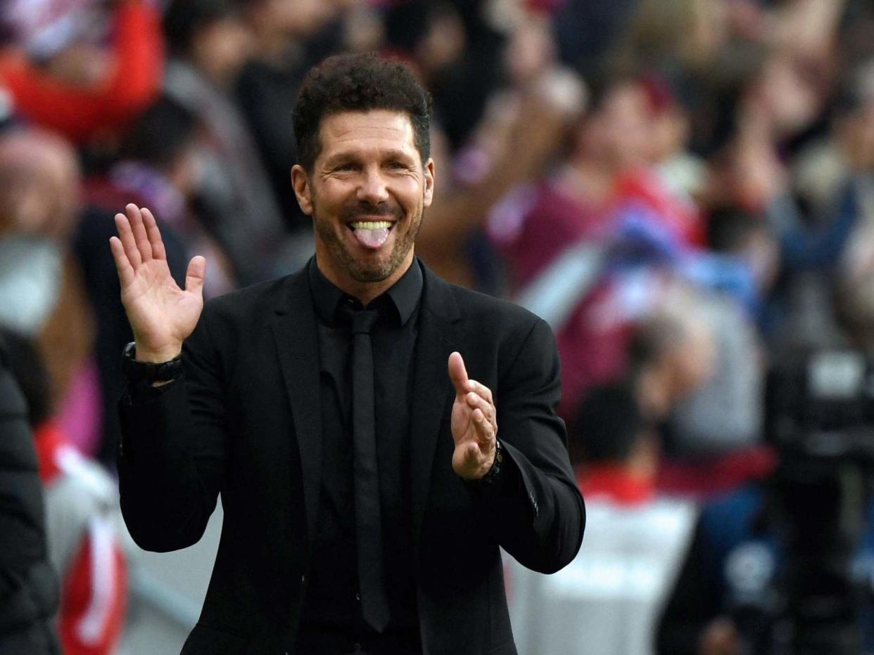 Diego Simeone's Atletico Madrid are one of the survivors of defence-first football: AFP via Getty
