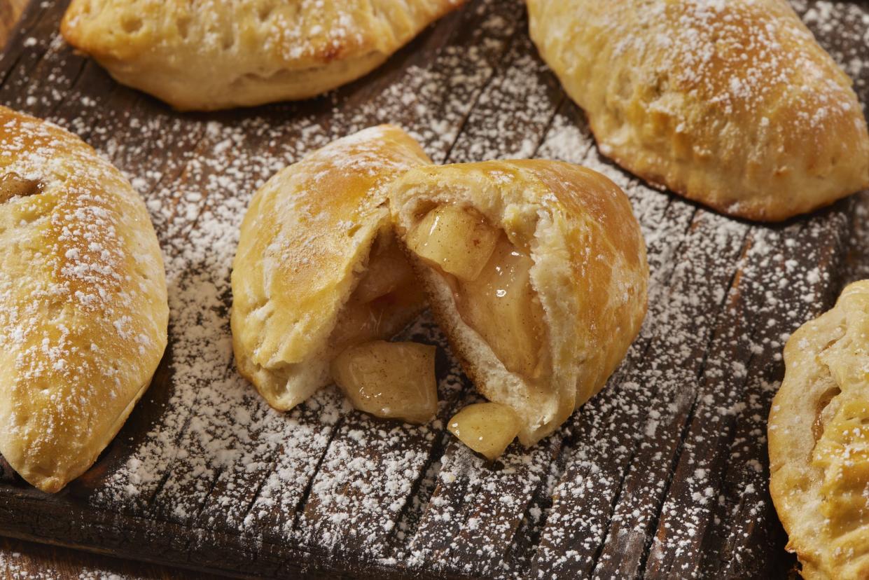 Preparing Apple Pie Hand Pies with powdered Sugar using Refrigerated Biscuit Dough