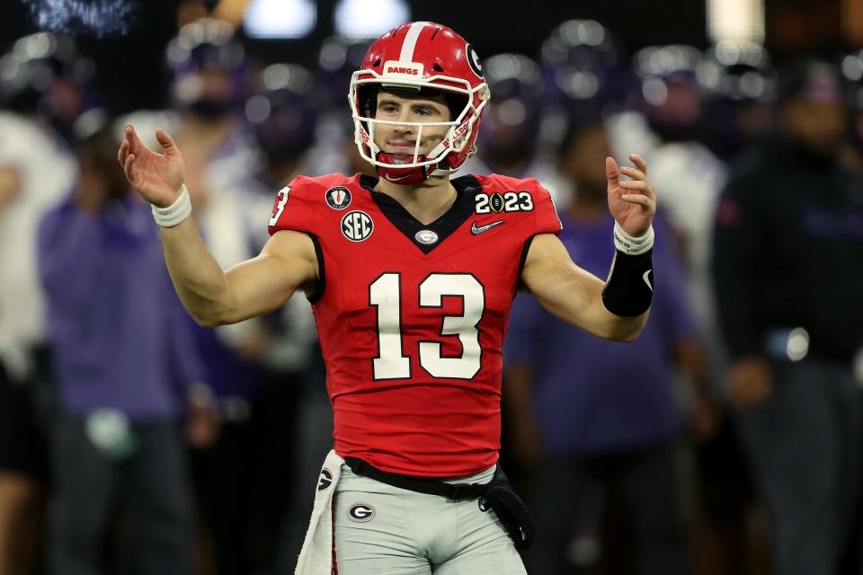 Stetson Bennett #13 of the Georgia Bulldogs reacts in the first half against the TCU Horned Frogs in the College Football Playoff National Championship game at SoFi Stadium on January 09, 2023 in Inglewood, California.