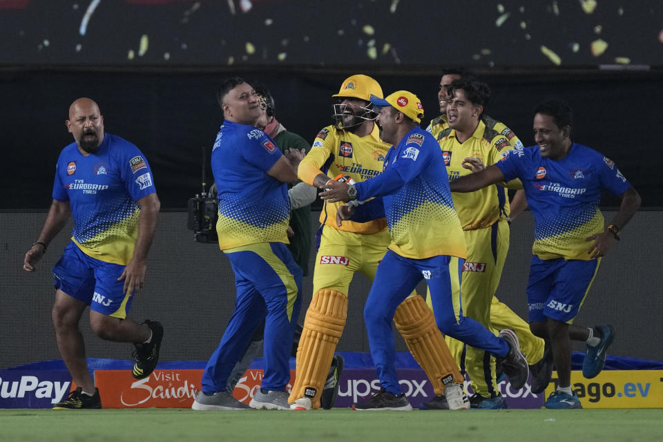 Chennai Super Kings' Ravindra Jadeja, center, celebrates after their win in the Indian Premier League final cricket match between Chennai Super Kings and Gujarat Titans in Ahmedabad, India, Monday, May 29, 2023. (AP Photo/Ajit Solanki)