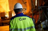 FILE PHOTO: An EDF worker is seen on the construction site of the third-generation European Pressurised Water nuclear reactor (EPR) in Flamanville, France, November 16, 2016. REUTERS/Benoit Tessier/File Photo