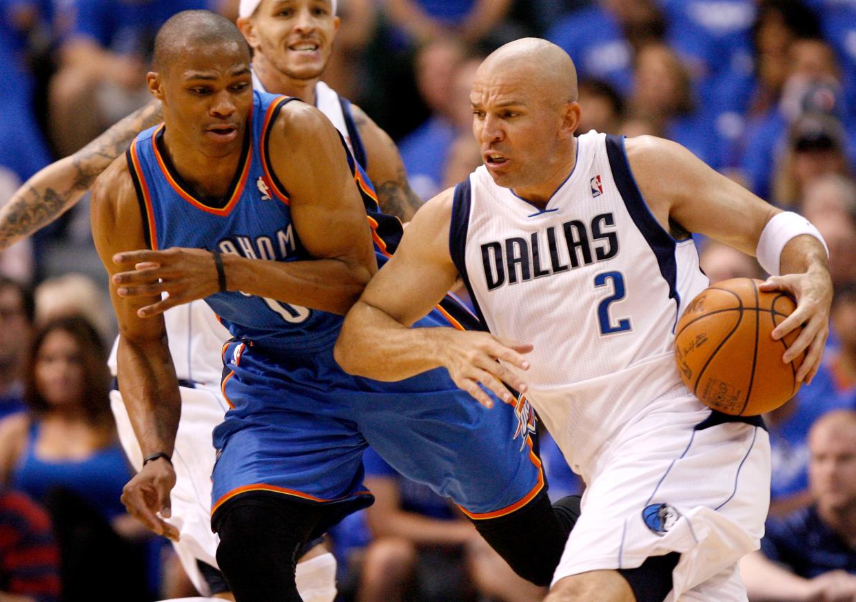 Dallas' Jason Kidd (2) tries to get around Oklahoma City's Russell Westbrook (0) during Game 3 of the first round in the NBA playoffs between the Oklahoma City Thunder and the Dallas Mavericks at American Airlines Center in Dallas, Thursday, May 3, 2012. Photo by Bryan Terry, The Oklahoman