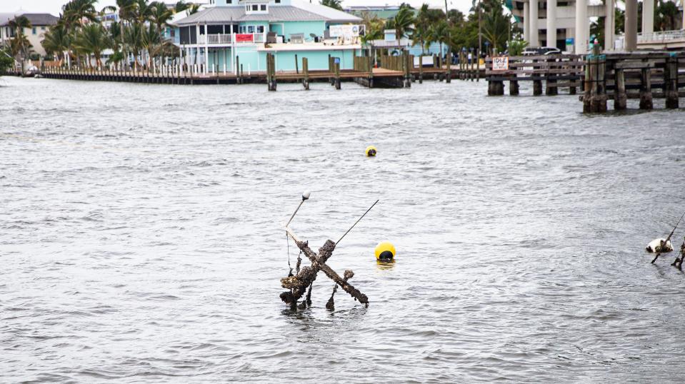 Before the boat on the dock at Bonita Bills can be removed, this sunken tug boat needs to be removed.