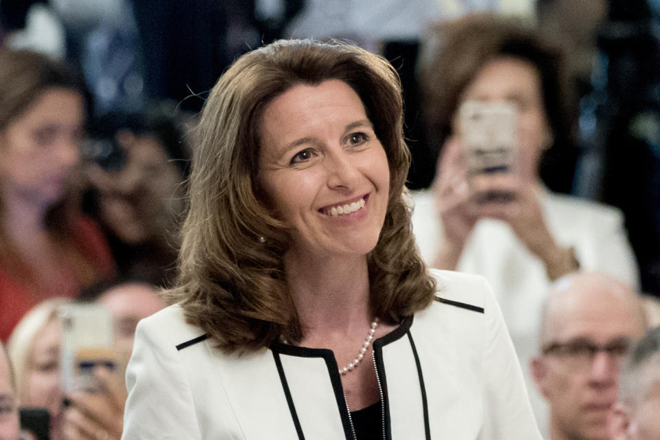 FILE - Northrop Grumman President and Chief Operating Officer Kathy Warden speaks in the East Room of the White House in Washington on July 19, 2018. At $19.5 million, Warden was the fifth highest-paid female CEO for 2021, as calculated by The Associated Press and Equilar, an executive data firm. (AP Photo/Andrew Harnik, File)