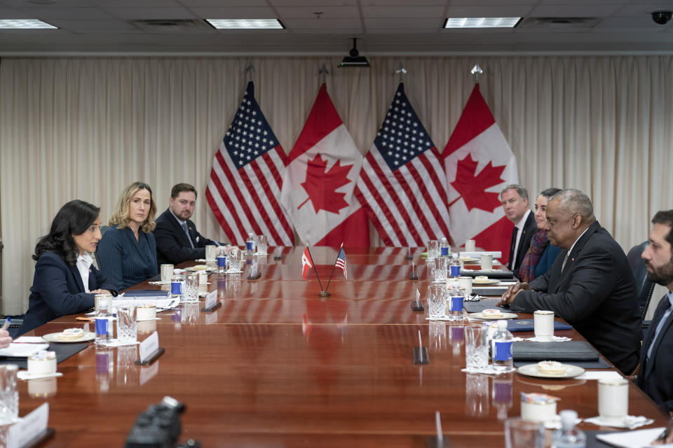 Secretary of Defense Lloyd Austin, right, meets with Canada's Minister of National Defense Anita Anand, far left, at the Pentagon in Washington, Friday, Feb. 10, 2023. (AP Photo/J. Scott Applewhite)