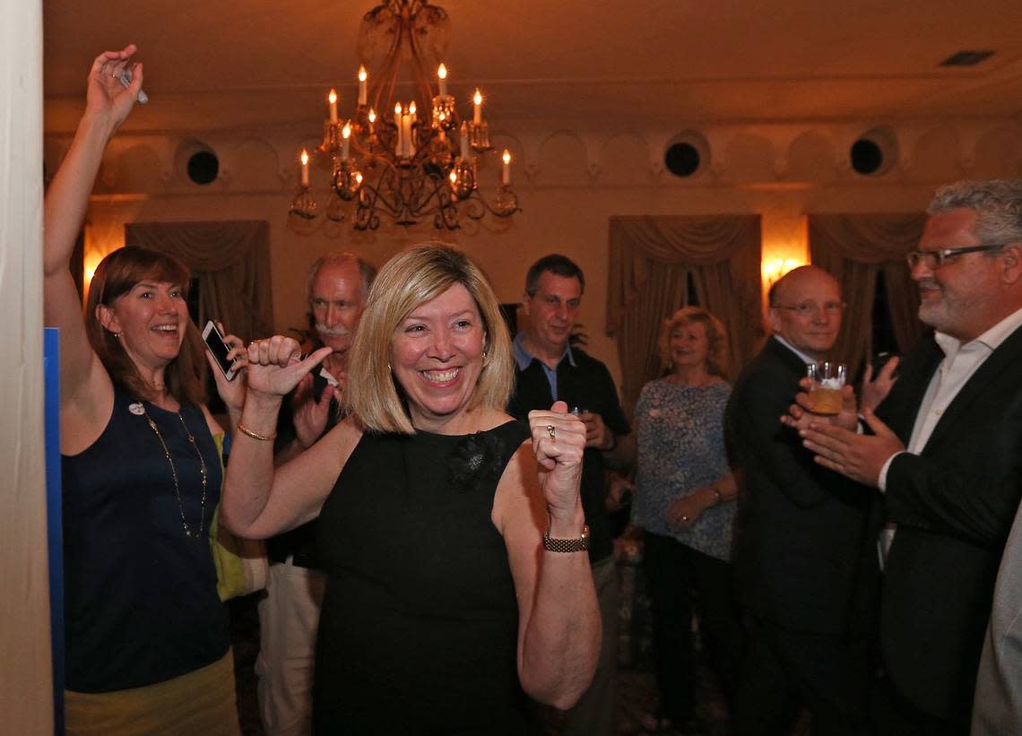 Jeannett Slesnick (center) and daughter Kathleen Slesnick Kauffman (at left) celebrate Jeannett winning a seat on the Coral Gables City Commission on April 14, 2015.