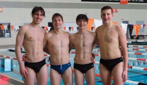 Brighton's 400-yard freestyle relay team consisted of (from left) John McHugh, Luke Newcomb, Noah Shand and Mason Staszel.