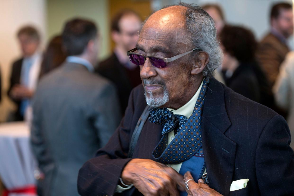 UofL Professor of Art History and Pan African Studies Dr. Robert Douglas arrives on the scene at The Ali Center for Muhammad Ali's 73rd birthday party on Saturday night. 1/17/15