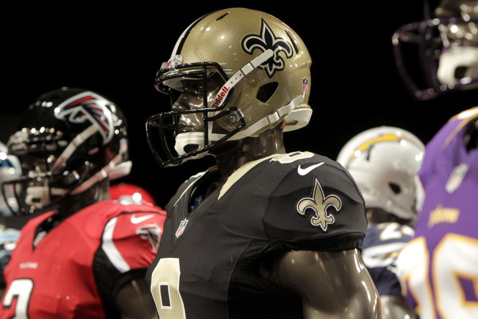 The new New Orleans Saints' uniform is displayed on a mannequin during a presentation in New York, Tuesday, April 3, 2012.  The NFL and Nike showed off the new look in grand style with a gridiron-styled fashion show at a Brooklyn film studio. (AP Photo/Seth Wenig)