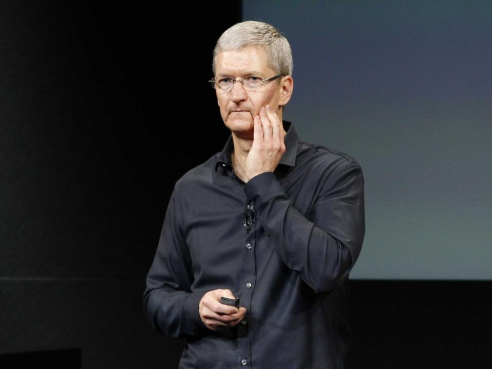 Tim Cook looking worried or sad