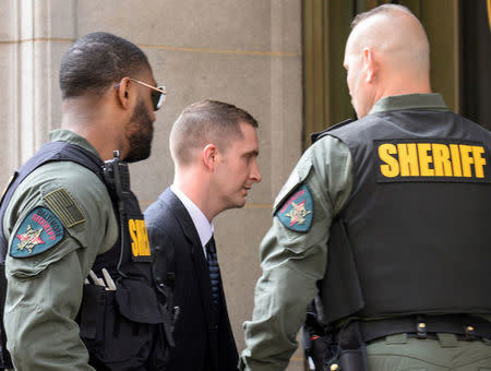 Baltimore police officer Edward Nero arrives for his trial in connection with the death of Freddie Gray at a courthouse in Baltimore. REUTERS/Bryan Woolston