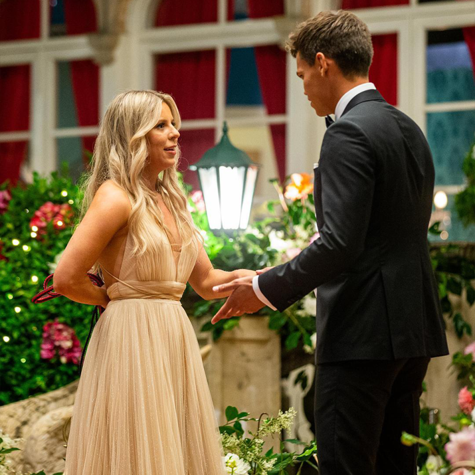 Bachelor Jimmy and Ashleigh meeting on the red carpet.