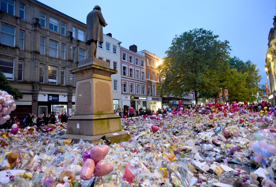 Floral tributes left in the wake of May’s Manchester Arena attack which left 23 dead (Rex)