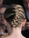 <p>Give a classic French plait a 2018 update by twisting it into a chic updo a la Emily Blunt.</p>