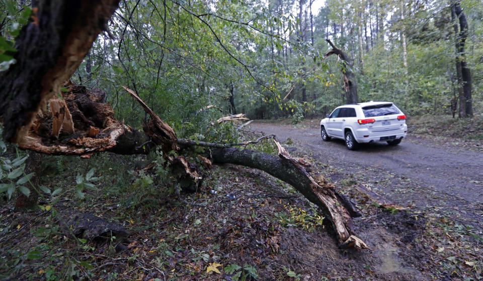 Storm system in Deep South leaves damage and death in its wake