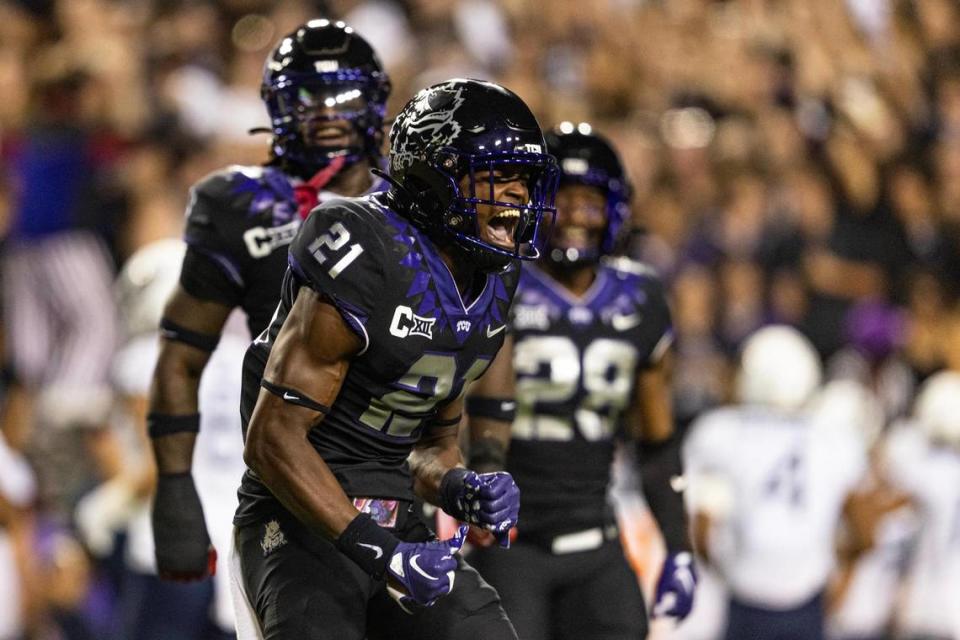 TCU safety Bud Clark (21) celebrates after an interception in the first quarter of a Big XII conference game between the TCU Horned Frogs and the West Virginia Mountaineers at Amon G. Carter Stadium in Fort Worth on Saturday, Sept. 30, 2023. The interception was later overturned. Chris Torres/ctorres@star-telegram.com