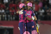 Rajasthan Royals' Dhruv Jurel, left is hugged by teammate Trent Boult after scoring the winning runs in the Indian Premier League cricket match against Punjab Kings in Dharamshala, India, Friday, May 19, 2023. (AP Photo /Ashwini Bhatia)
