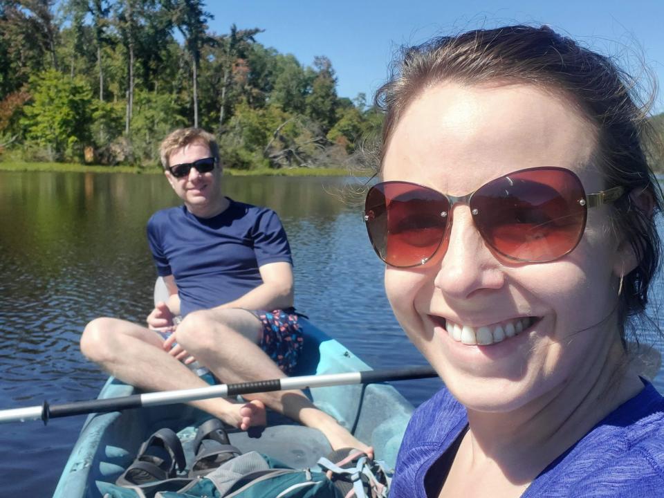 Katie Matthews and her husband sitting in a kayak.