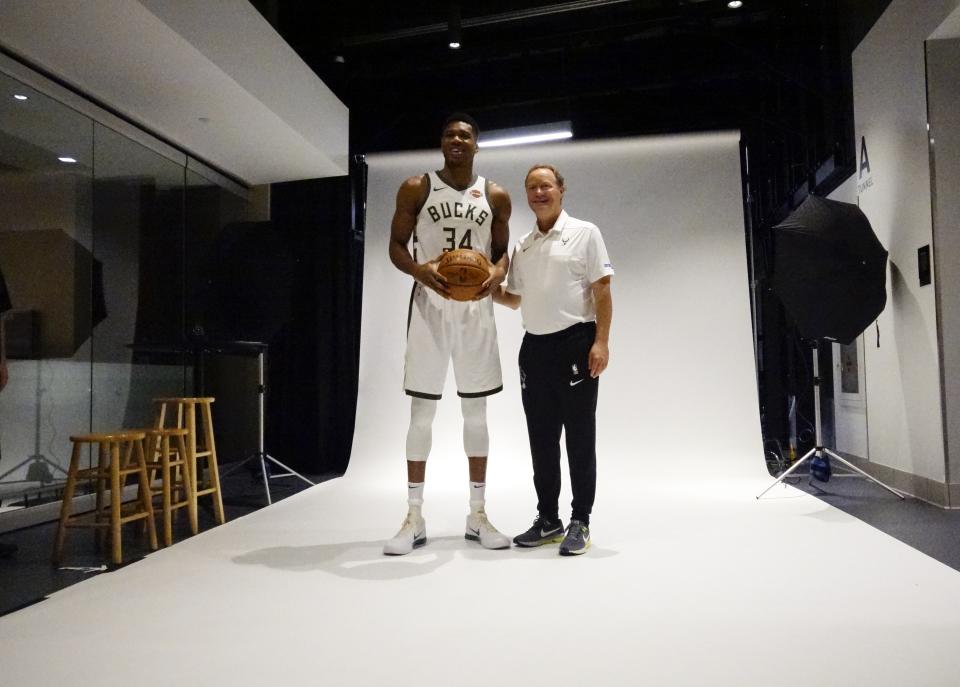 Milwaukee Bucks head coach Mike Budenholzer poses with Giannis Antetokounmpo during media day at the NBA basketball team's new arena Monday, Sept. 24, 2018, in Milwaukee. (AP Photo/Morry Gash)