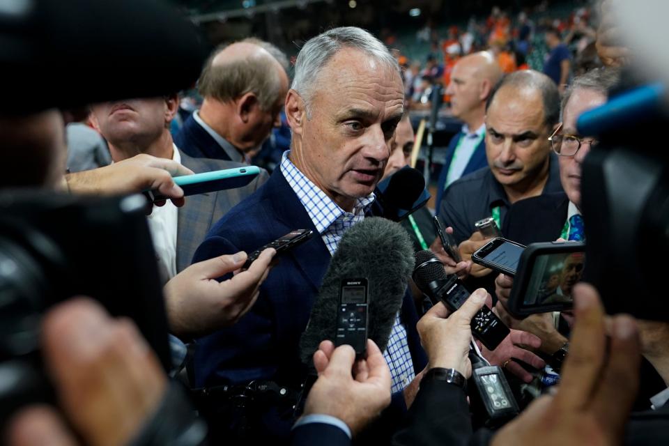 Commissioner of Major League Baseball. Robert D. Manfred, Jr. talks with the media before Game 1 in baseball's World Series between the Houston Astros and the Atlanta Braves Tuesday, Oct. 26, 2021, in Houston. (AP Photo/David J. Phillip)