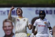 Australia's Mitchell Swepson reacts after taking the wicket of Sri Lanka's Pathum Nissanka during the day three of the first test cricket match between Australia and Sri Lanka in Galle, Sri Lanka, Friday, July 1, 2022. (AP Photo/Eranga Jayawardena)