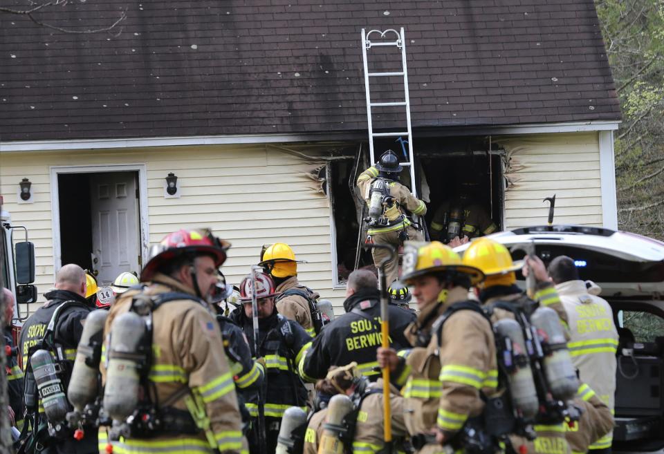 South Berwick Fire Department as well as mutual aid from surrounding towns respond to a house fire at 32 Witchtrot Road Tuesday, May 2, 2023.