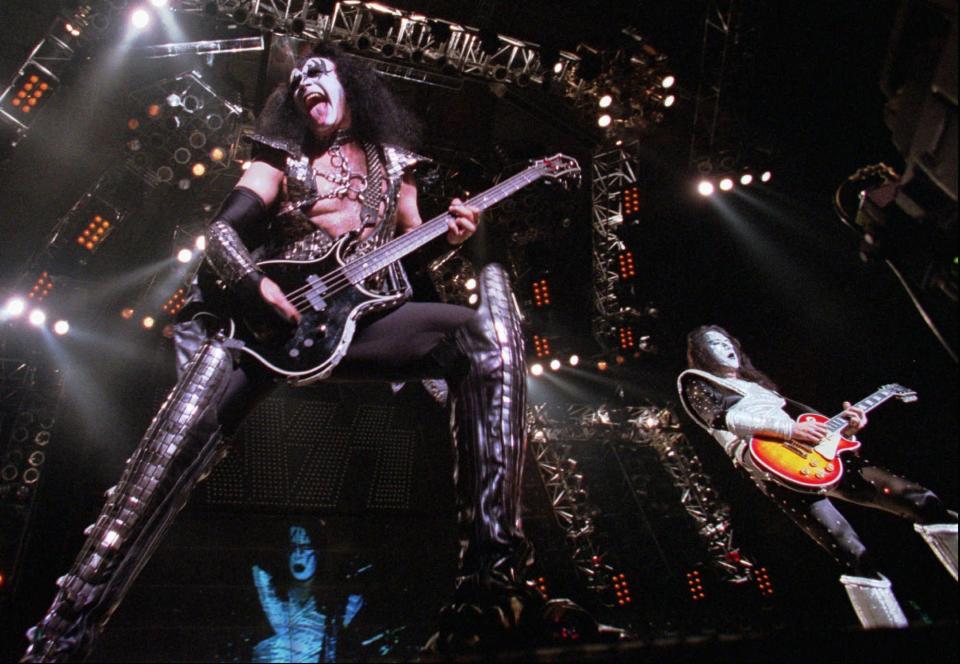 Kiss bassist Gene Simmons, left, and guitarist Ace Frehley perform at Tiger Stadium in Detroit Friday, June 28, 1996.