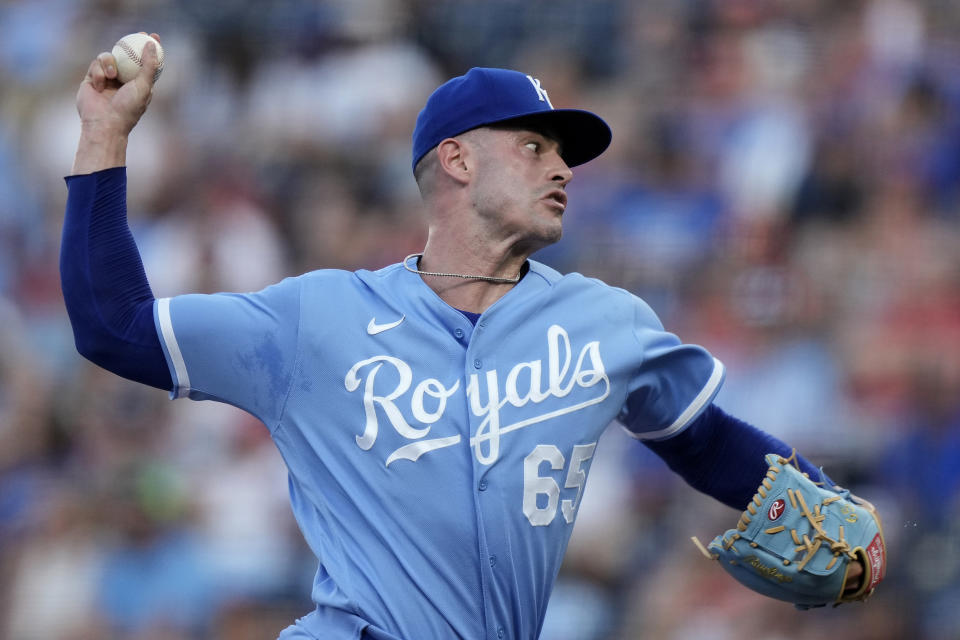 Kansas City Royals starting pitcher Dylan Coleman throws during the first inning of a baseball game against the St. Louis Cardinals Friday, Aug. 11, 2023, in Kansas City, Mo. (AP Photo/Charlie Riedel)