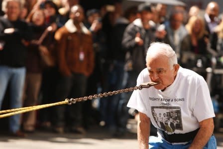 As The Mighty Atom, Joe Greenstein's feats of strength inspired the creation of a DC Comics superhero named after him. But we would argue the strongman feats of his son, Mike Greenstein, were even more heroic. At 93 years young, Mike was still <a href="https://www.youtube.com/watch?v=NxLEkq0ikFU" target="_hplink">pulling a 3500 pound truck</a> with his teeth on the 2014 season of America's Got Talent in an astounding effort to carry on his father's legacy.