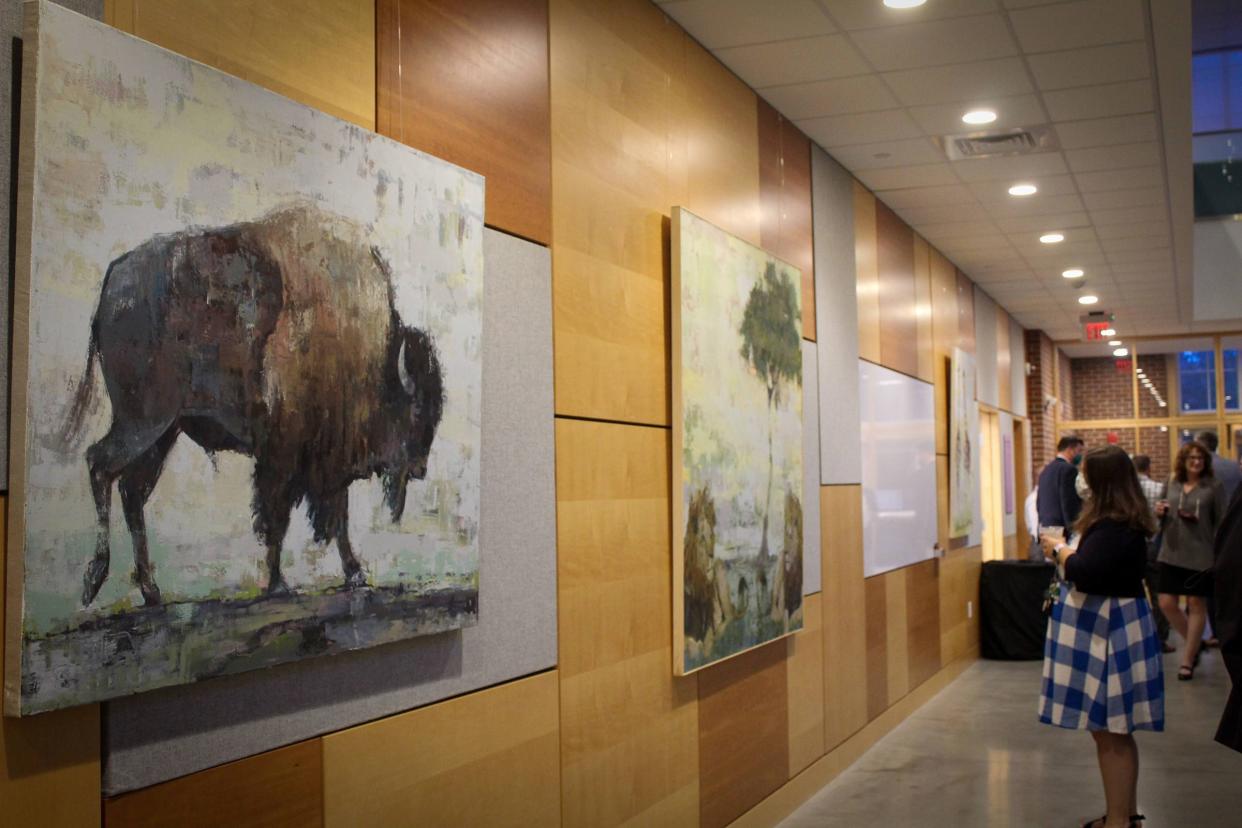 Among the art displayed at Nichols College is a painting of a bison, the college’s mascot, by Brian Keith Stevens. The work, commissioned by Nichols President Glenn Sulmasy and his wife, Marla, will be a permanent fixture on campus.