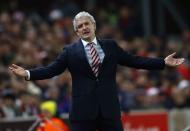 Stoke City manager Mark Hughes reacts during their English Premier League soccer match against Chelsea at the Britannia Stadium in Stoke-on-Trent, northern England December 22, 2014. REUTERS/Darren Staples