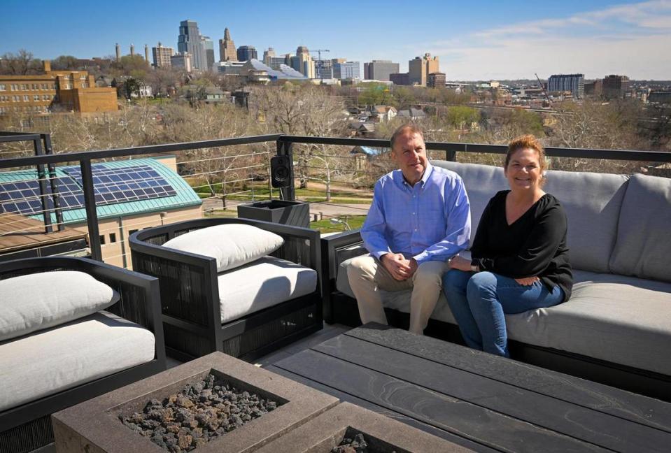 “The neighborhood is endearing and embracing if they sense that you’re here to be part of it, and not walk all over it,” said Jeff Kuenne, with wife, Diane, on the rooftop deck of the West Side home they moved into in 2022.