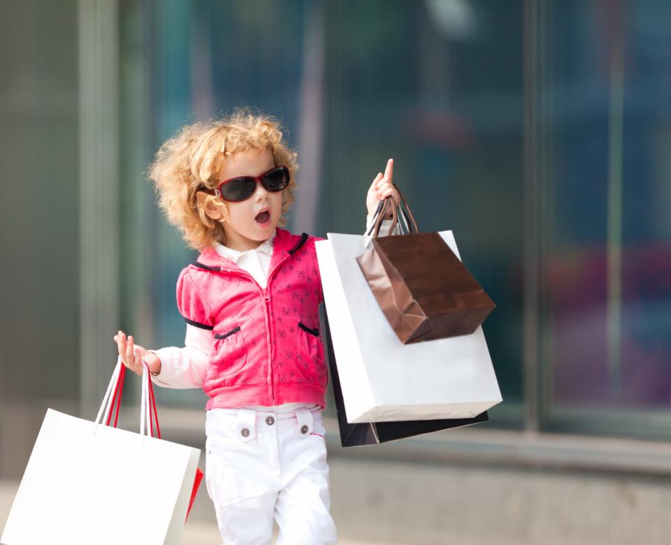 Child with shopping bags