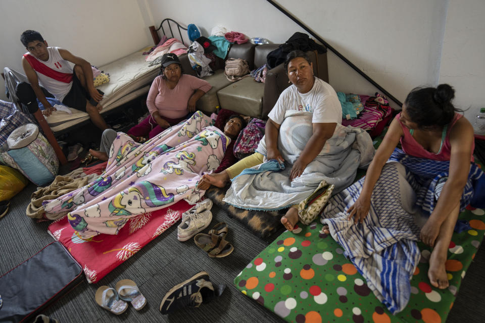 FILE - Out-of-town, anti-government protesters begin waking after spending the night in a safehouse in an industrial corridor of Lima, Peru, Feb. 8, 2023. In recent weeks, thousands of Quechua and Aymara activists have descended on Peru’s capital to expand demonstrations that had started in the country’s southern region. (AP Photo/Rodrigo Abd, File)