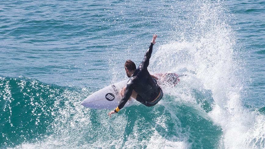 These Hot Photos Of Chris Hemsworth Surfing Will Make Your Friday