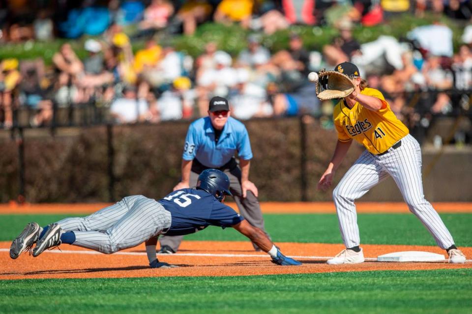 Southern Miss’s Christopher Sargent catches a ball at first base as UTSA’s Ian Bailey slides back to first base during a game against UTSA during the Conference USA tournament at Pete Taylor Park in Hattiesburg on Saturday, May 28, 2022.