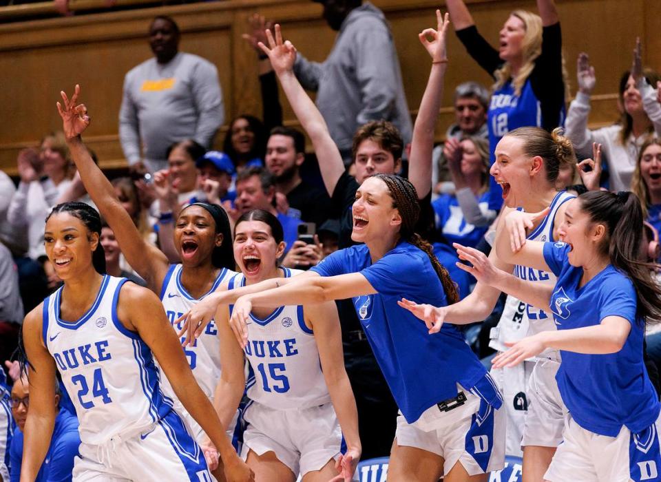 The Duke bench reacts after a three-point basket by Reigan Richardson during the second half of the Blue Devils’ 69-58 win over N.C. State on Sunday, Feb. 25, 2024, at Cameron Indoor Stadium in Durham, N.C.