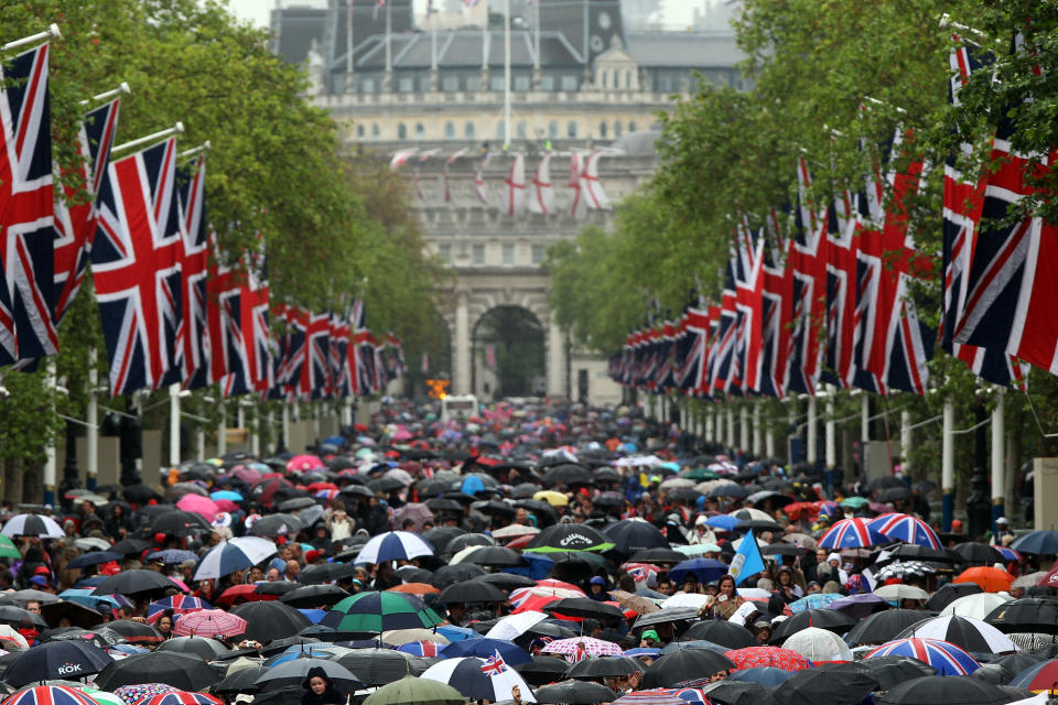 LONDON, ENGLAND - JUNE 05: Crowds fill The Mall after the Diamond Jubilee carriage procession after the service of thanksgiving at St.Paul’s Cathedral on the Mall on June 5, 2012 in London, England. For only the second time in its history the UK celebrates the Diamond Jubilee of a monarch. Her Majesty Queen Elizabeth II celebrates the 60th anniversary of her ascension to the throne. Thousands of wellwishers from around the world have flocked to London to witness the spectacle of the weekend's celebrations. (Photo by Dan Kitwood/Getty Images)