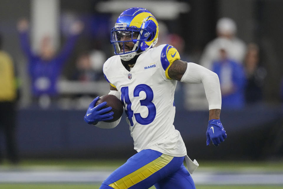 Los Angeles Rams safety John Johnson III (43) runs back with an intercepted pass during the second half of an NFL football game against the Cleveland Browns, Sunday, Dec. 3, 2023, in Inglewood, Calif. (AP Photo/Mark J. Terrill)