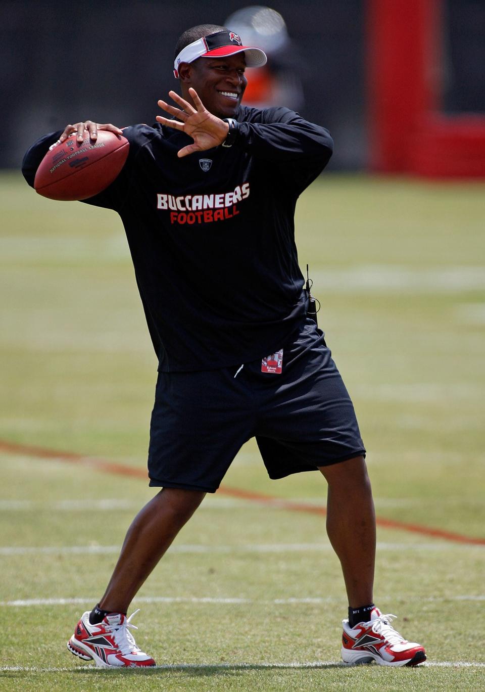 TAMPA, FL - MAY 01:  Head coach Raheem Morris of the Tampa Bay Buccaneers warms up during the Buccaneers Rookie Minicamp at One Buccaneer Place on May 1, 2009 in Tampa, Florida.  (Photo by J. Meric/Getty Images)