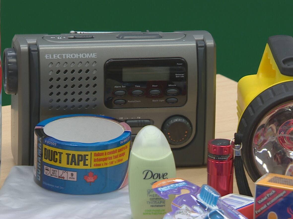 Emergency kits that include flashlights, duct tape and battery-powered radios can help people if they need to shelter in place or flee. Halifax Regional Fire and Emergency plans to distribute 1,000 similar kits to families in the municipality. (CBC - image credit)