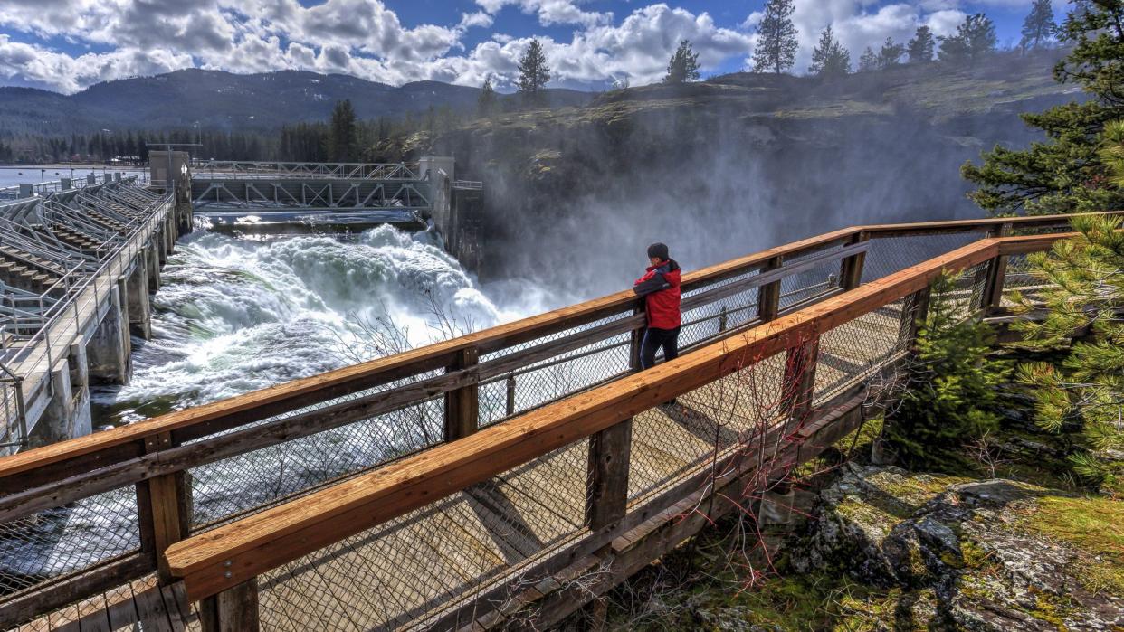 person watching waterfall in Idaho