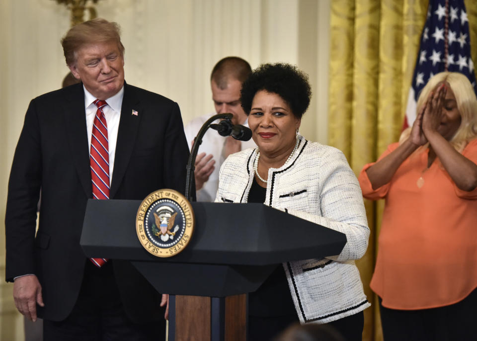 WASHINGTON, DC - APRIL 1: President Donald Trump, left, listens to Alice Johnson, whose sentence Trump commuted, as she participates in the 2019 Prison Reform Summit and First Step Act Celebration at the White House, on April, 01, 2019 in Washington, DC. (Photo by Bill O'Leary/The Washington Post via Getty Images)