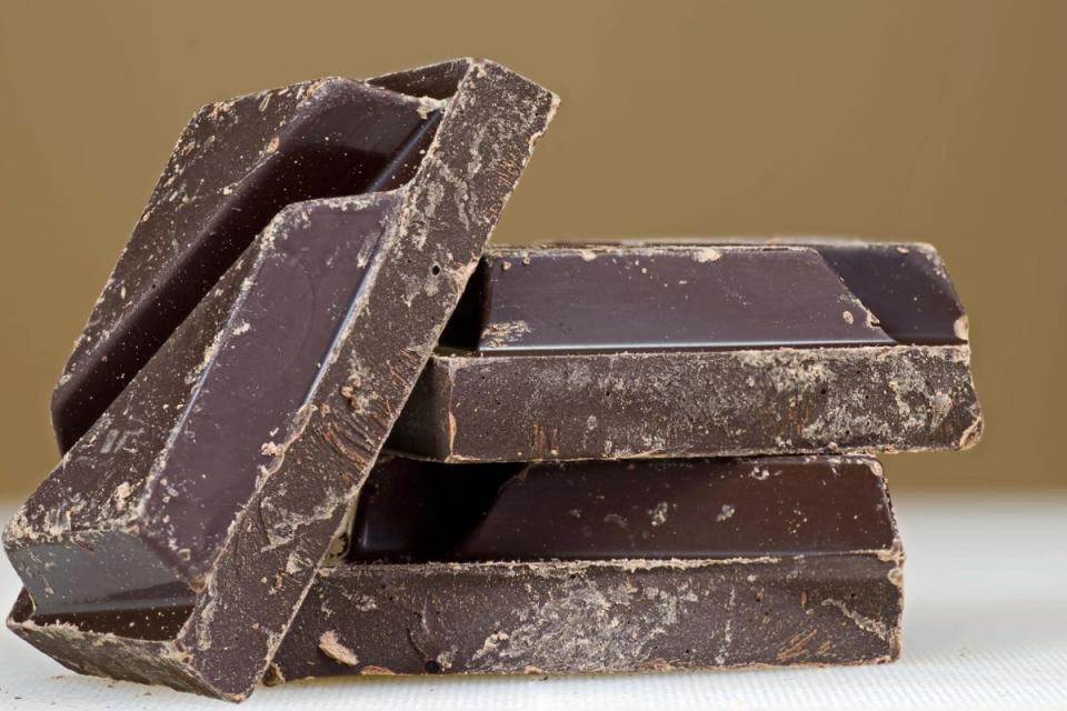 Dark chocolate is high in prebiotic fibre which helps to maintain intestinal health (Alamy/PA)