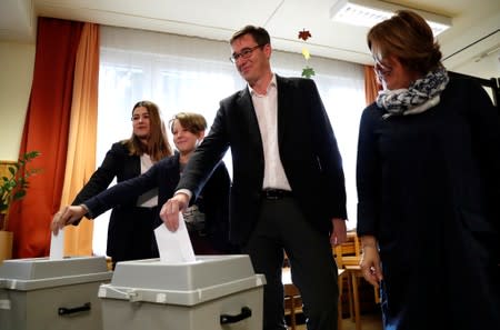 Karacsony, opposition parties' candidate casts his ballot with his family during Hungary's local elections in Budapest