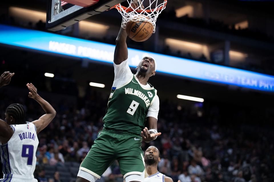 FILE - Milwaukee Bucks center Bobby Portis (9) dunks during the second half of the team's NBA basketball game against the Sacramento Kings in Sacramento, Calif., Wednesday, March 16, 2022.  Now that he's signed a long-term deal to stay with the Bucks, Portis is eager to help them attempt another title run. (AP Photo/José Luis Villegas, File)