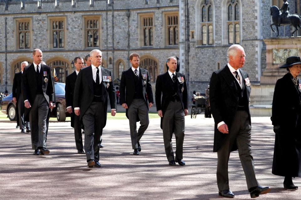 Britain's Prince Charles, Prince of Wales (R), Britain's Prince William, Duke of Cambridge, (L) and Britain's Prince Harry, Duke of Sussex