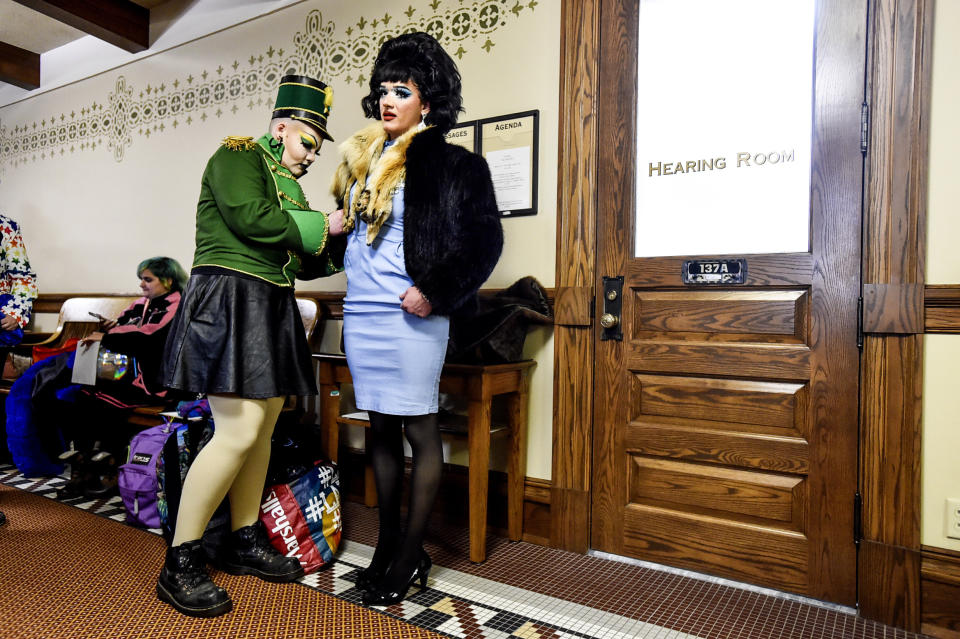 FILE - Scenes from a drag show at the Montana Capitol held in protest to a slate of bills aimed at how trans Montanans live, April 13, 2023, in Helena, Mont. Montana became the first state to specifically ban drag reading events. A transgender woman, an independent bookstore and an educator who dresses up as characters while teaching her students are among the plaintiffs in a lawsuit filed Thursday, July 6, seeking to overturn the ban. (Thom Bridge/Independent Record via AP, File)